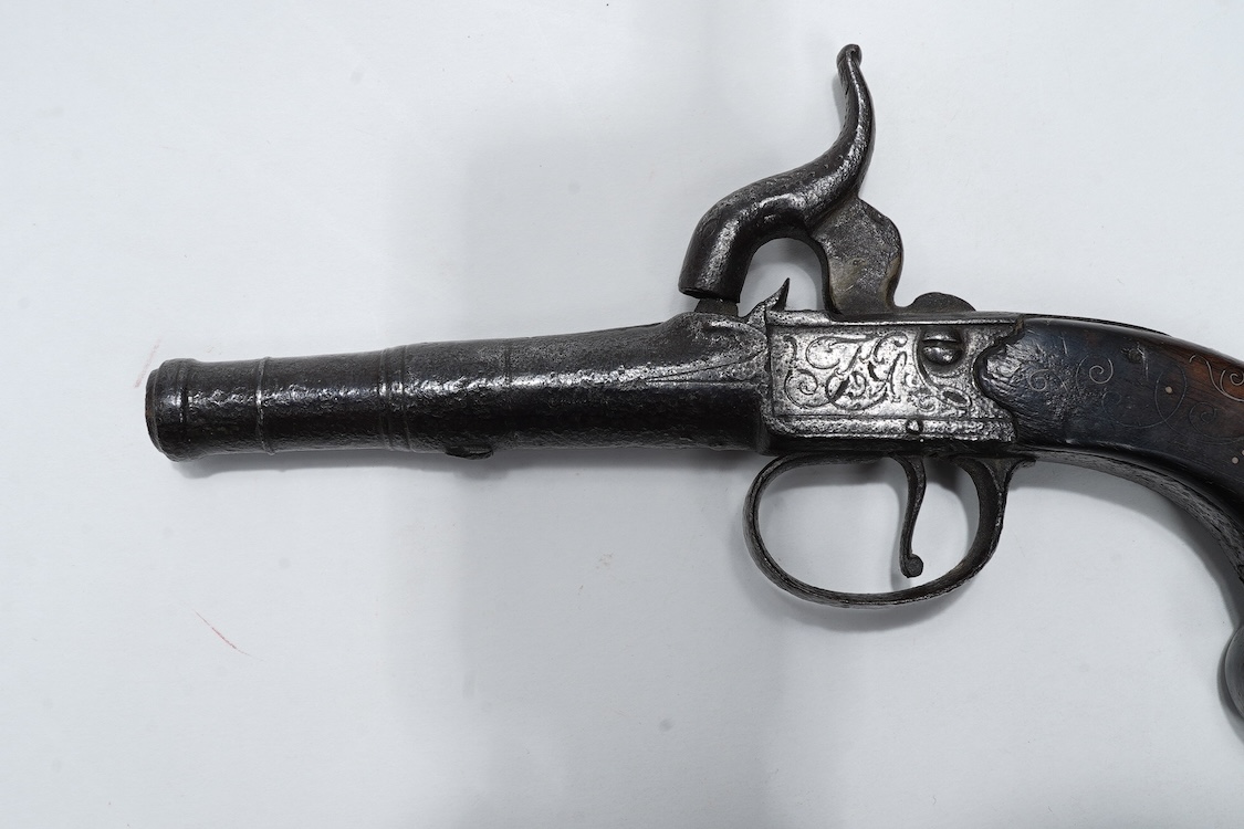 A boxlock percussion travelling pistol, with turn off cannon barrel, 5cm, and London proof marks, frame engraved; TG, with slab walnut grip with silver wire inlay